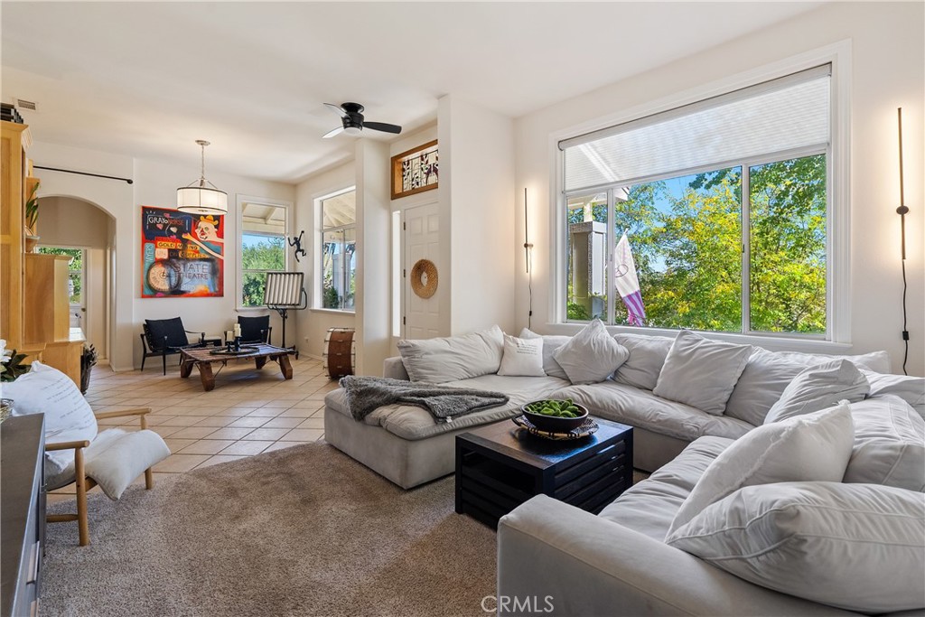 1329 Crown Way Paso Robles, CA 93446 - Photo 8 of 57 a living room with furniture and a large window