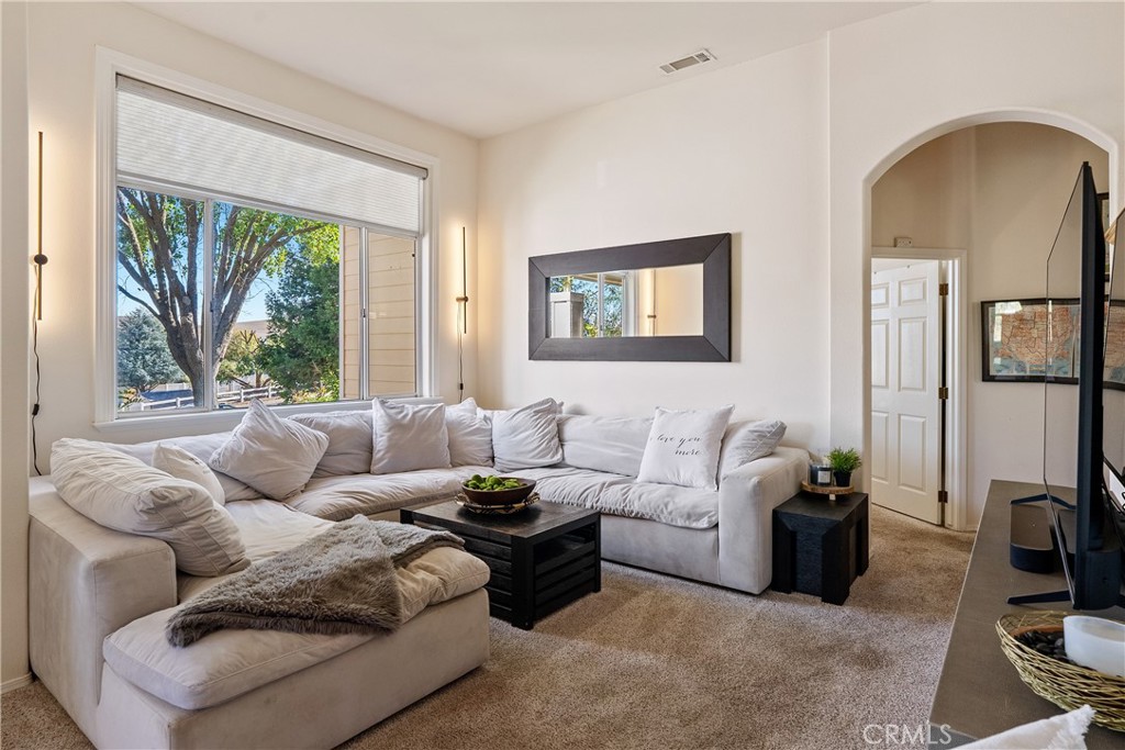 1329 Crown Way Paso Robles, CA 93446 - Photo 9 of 57 a living room with furniture and a flat screen tv