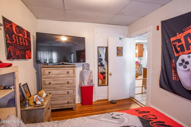 a bedroom with a bed and furniture