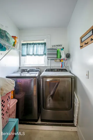 a utility room with washer and dryer