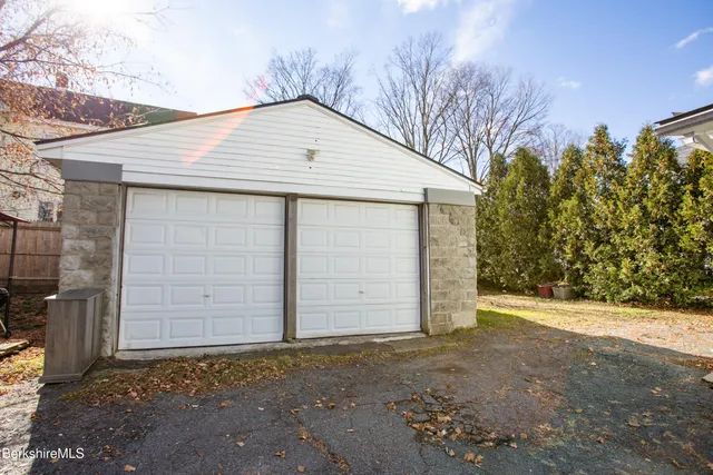 a view of a house with a garage