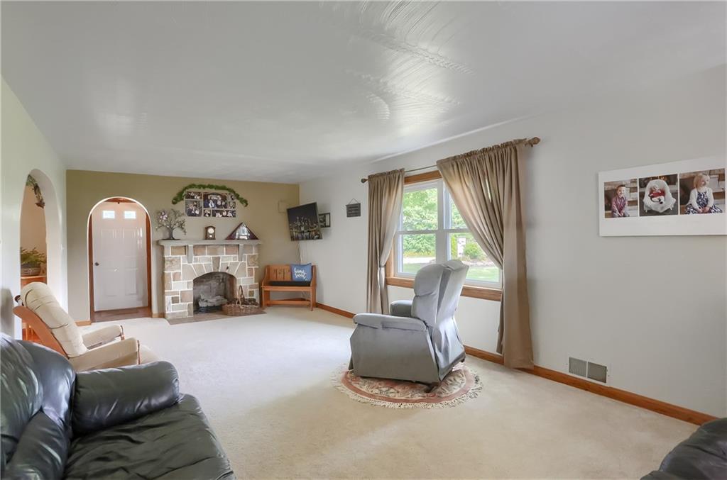 104 Hepler Road Sarver, PA 16055 - Photo 18 of 30 a living room with furniture and a fireplace