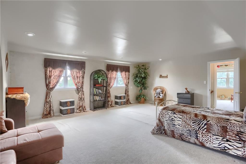 104 Hepler Road Sarver, PA 16055 - Photo 24 of 30 a bedroom with furniture and a window