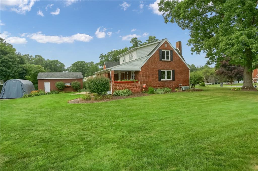 104 Hepler Road Sarver, PA 16055 - Photo 4 of 30 a front view of house with yard and green space