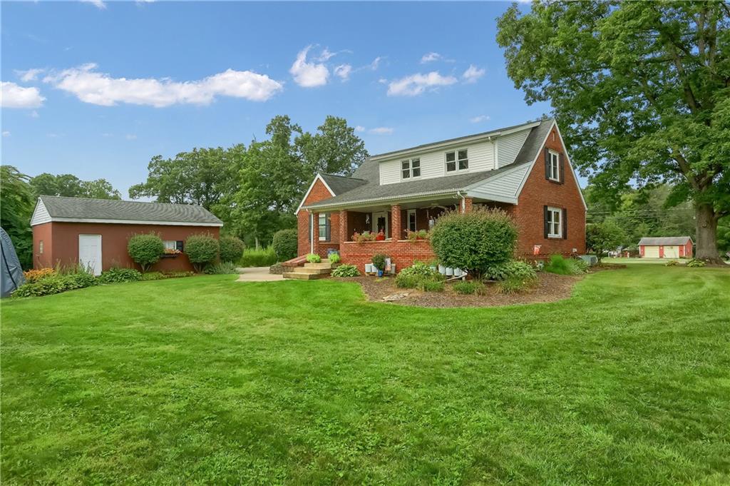 104 Hepler Road Sarver, PA 16055 - Photo 5 of 30 a front view of house with yard and green space