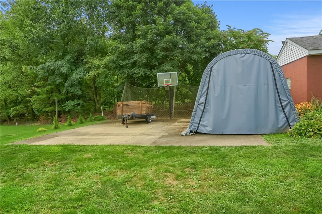 104 Hepler Road Sarver, PA 16055 - Photo 8 of 30 a view of backyard with a slide and swing