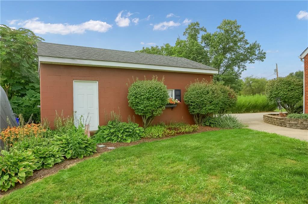 104 Hepler Road Sarver, PA 16055 - Photo 9 of 30 a front view of a house with garden