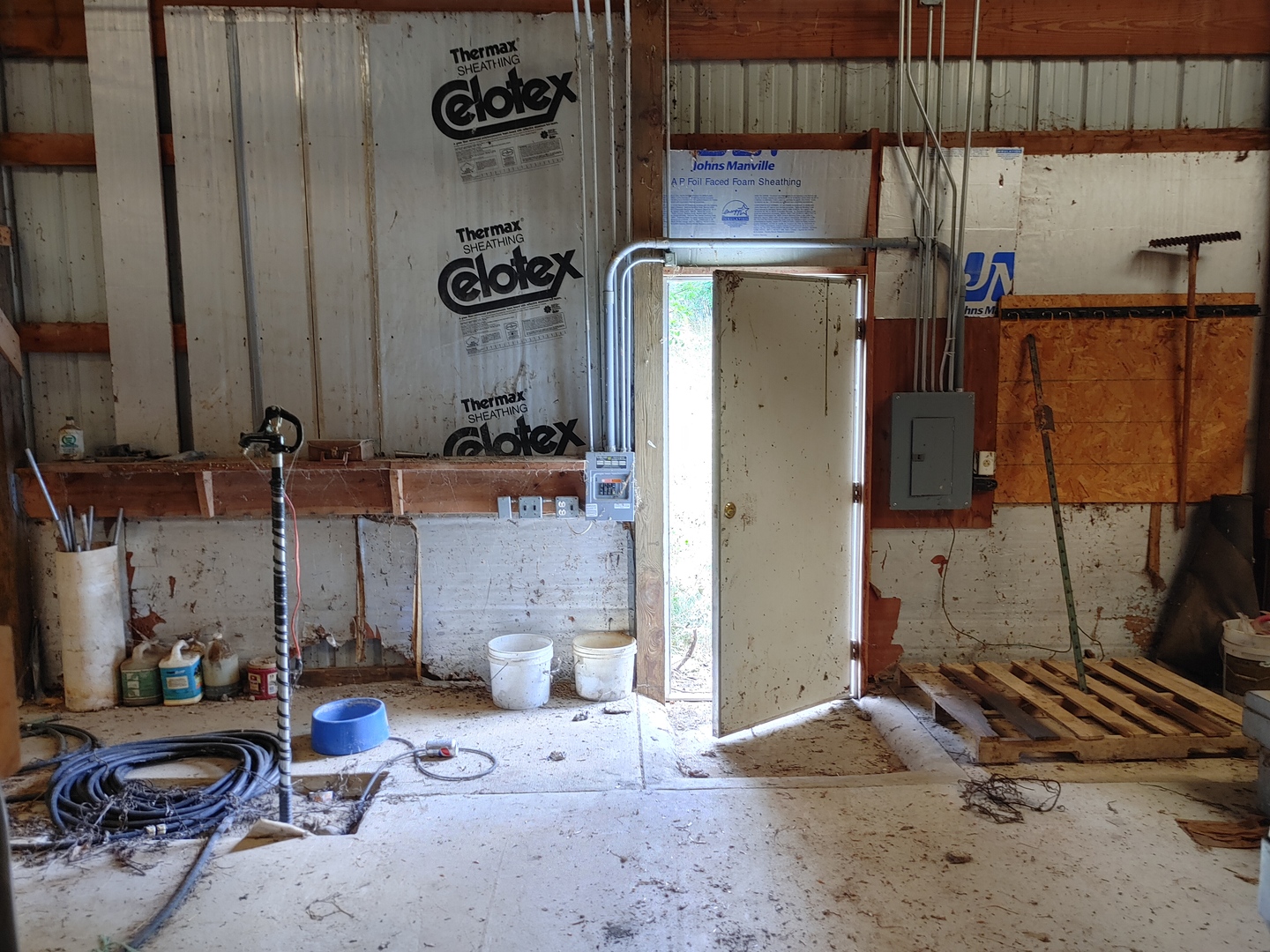 16814 Green Road Harvard, IL 60033 - Photo 13 of 18 a room with water heater and a wooden cabinets