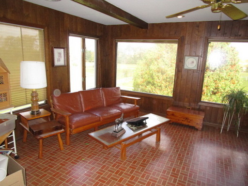 16814 Green Road Harvard, IL 60033 - Photo 8 of 18 a living room with furniture and a window