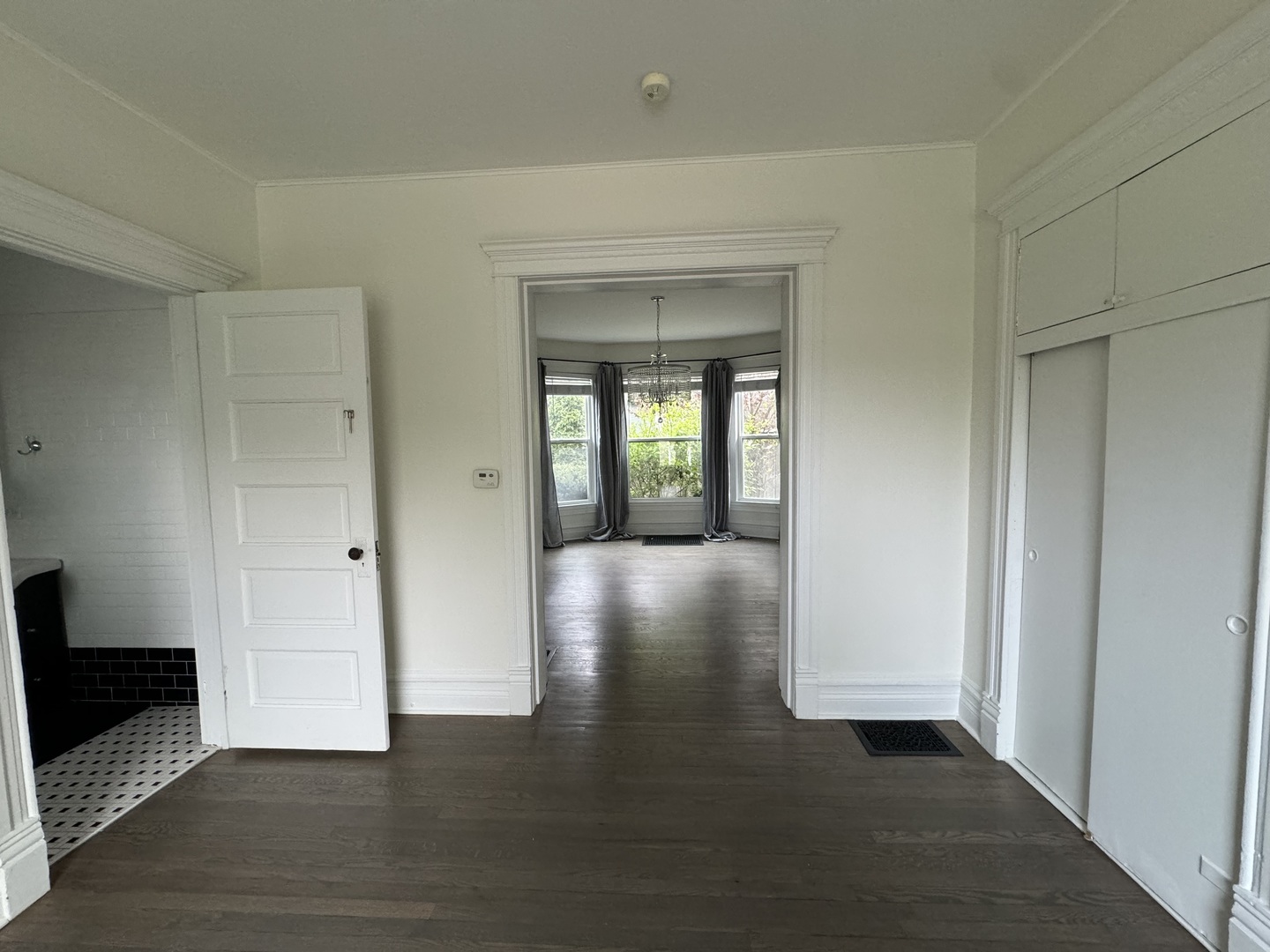 103 South 4th Street, Unit 1 St. Charles, IL 60174 - Photo 12 of 22 a view of livingroom and hallway with wooden floor