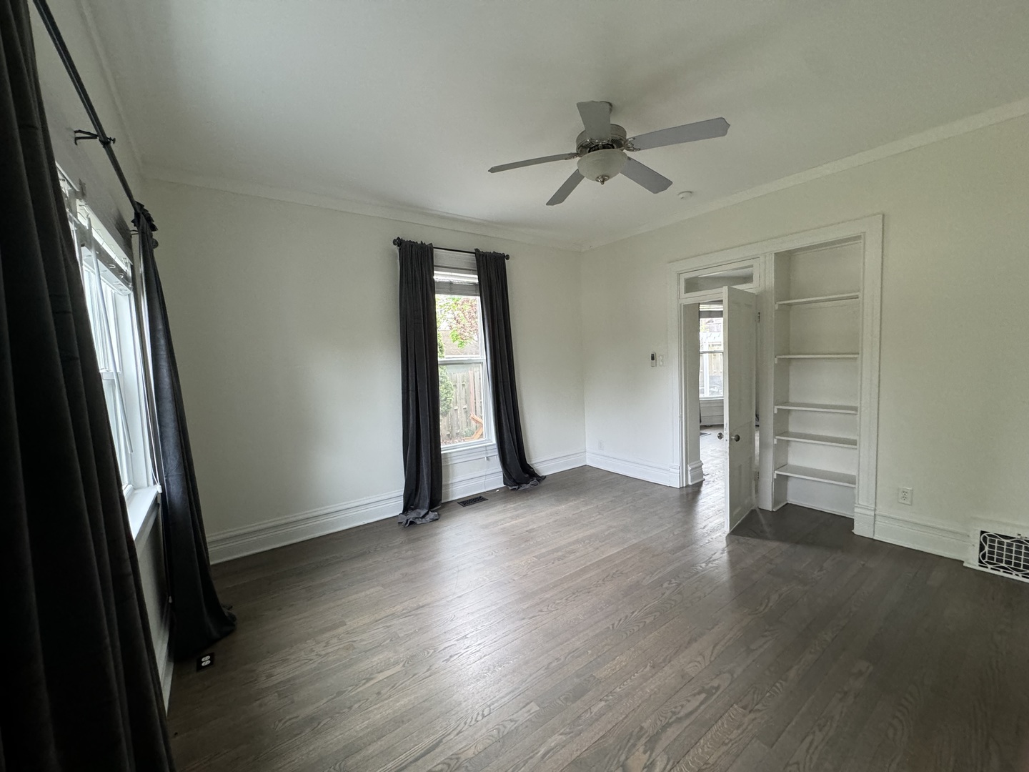 103 South 4th Street, Unit 1 St. Charles, IL 60174 - Photo 15 of 22 wooden floor in an empty room with a window