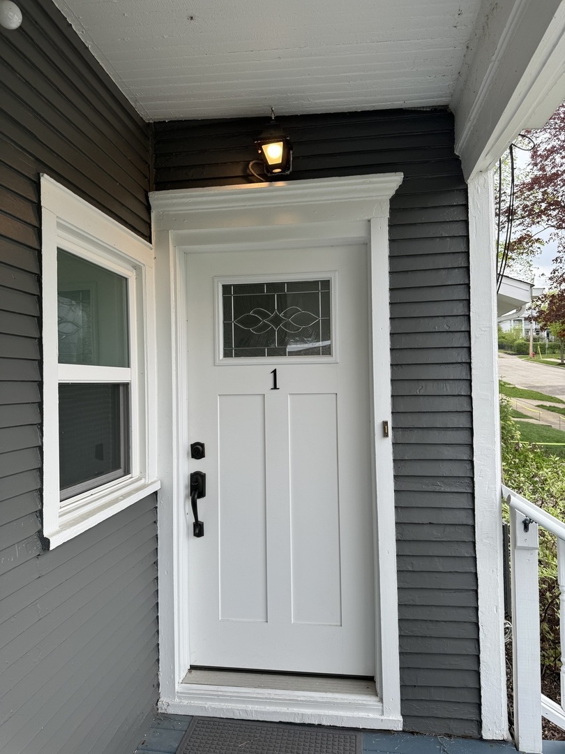103 South 4th Street, Unit 1 St. Charles, IL 60174 - Photo 3 of 22 a view of a door of the house