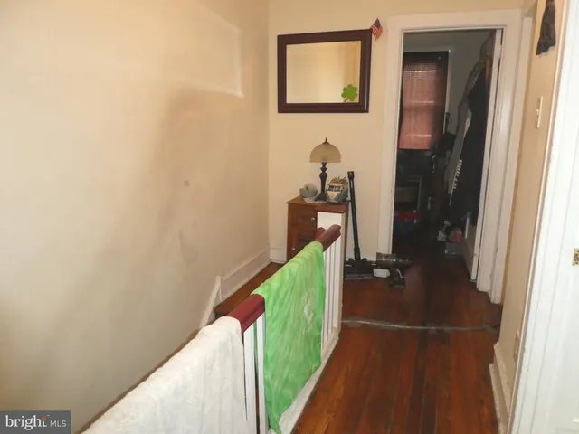 a bathroom with a sink a toilet and vanity