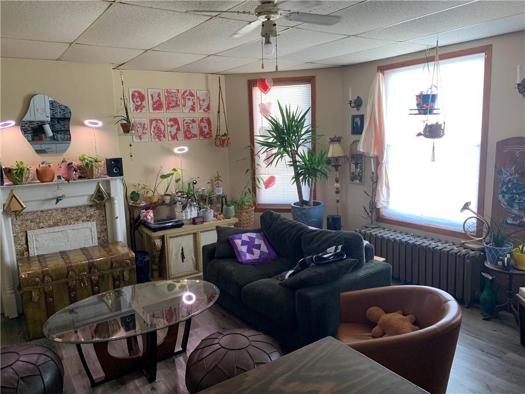498 East High Street Kittanning, PA 16201 - Photo 4 of 6 a living room with furniture and a large window