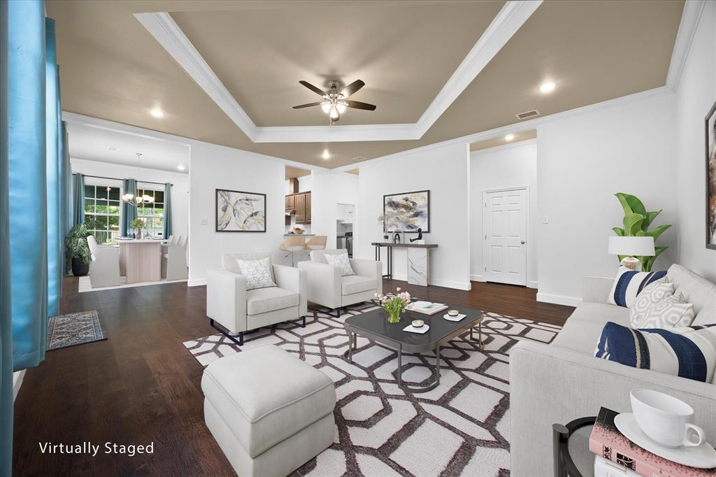 2526 Fox Point Circle Quinlan, TX 75474 - Photo 10 of 35 Expansive family room opens onto breakfast room and kitchen