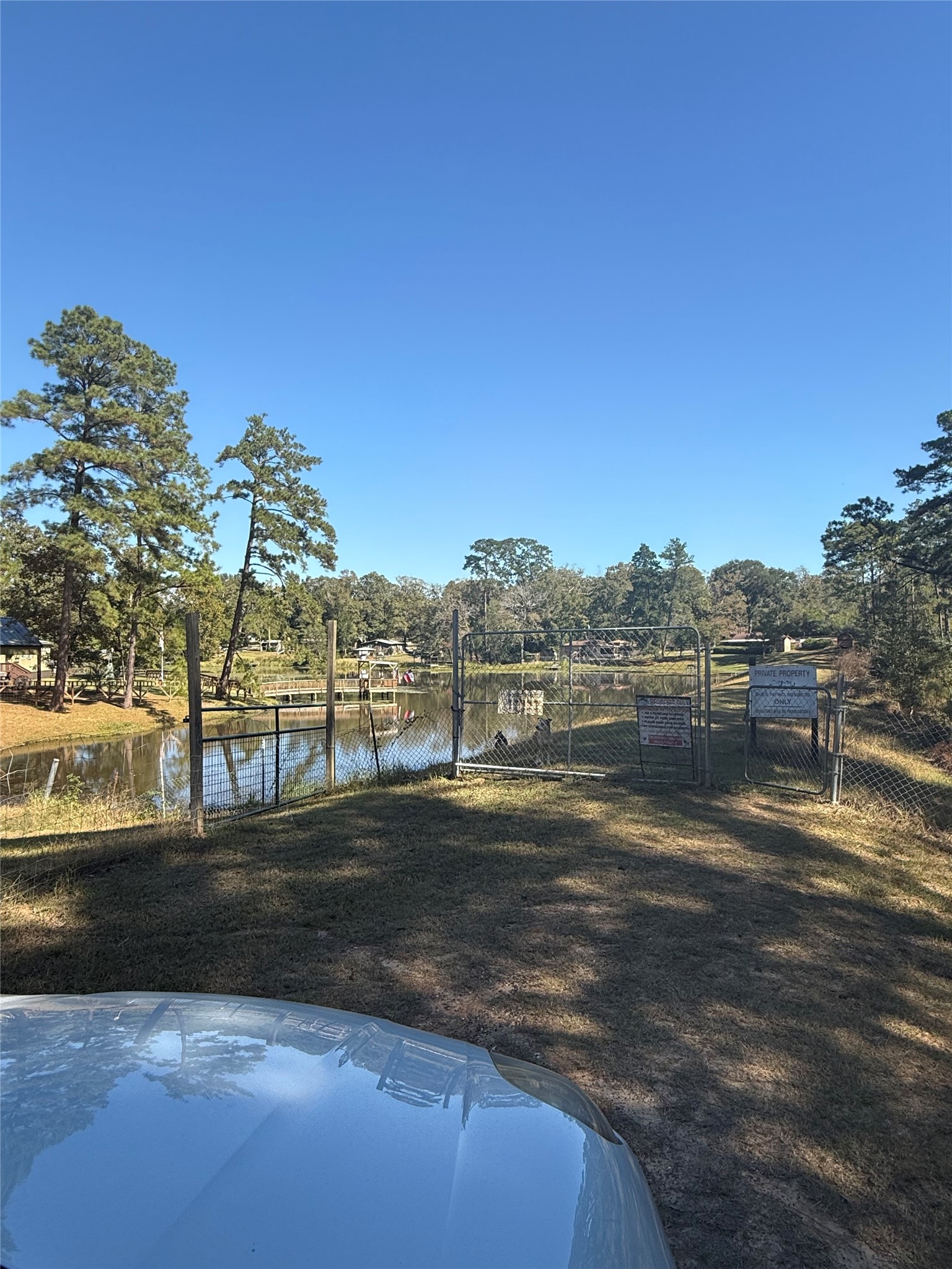 Tbd3 Lake Shore Drive Conroe, TX 77303 - Photo 3 of 6 a view of a lake with houses