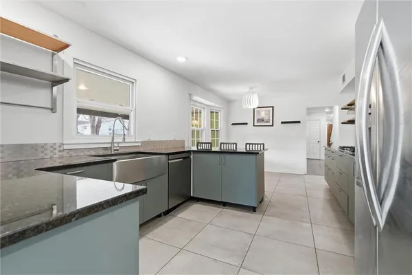 $539,900 | 1038 North Woodland Court, Oakwood, MO 64118