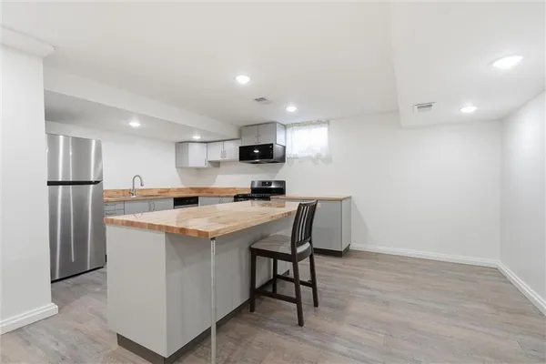 $539,900 | 1038 North Woodland Court, Oakwood, MO 64118