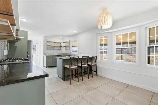 $539,900 | 1038 North Woodland Court, Oakwood, MO 64118