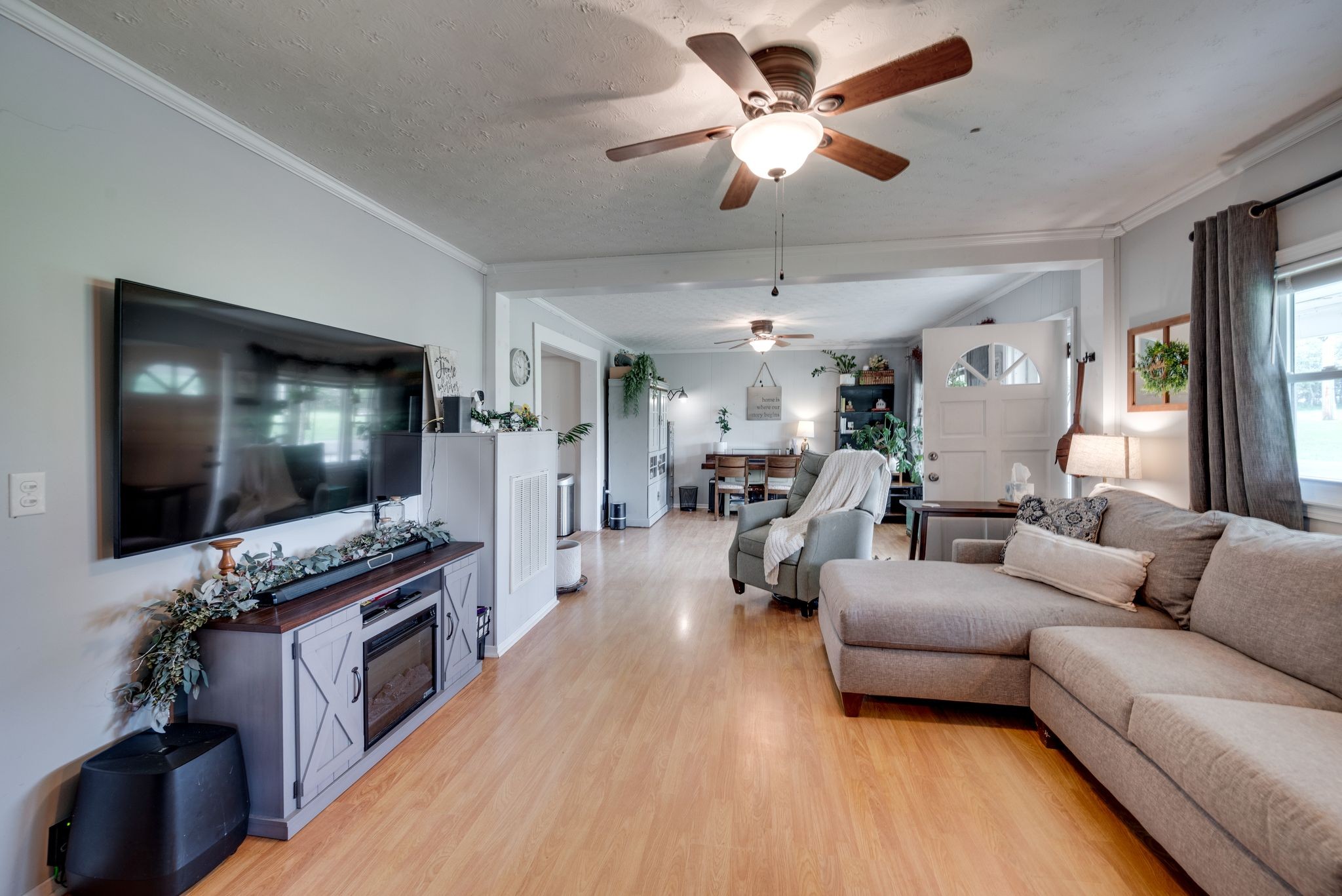 2575 Battle Creek Road Springfield, TN 37172 - Photo 8 of 26 a living room with furniture and a flat screen tv