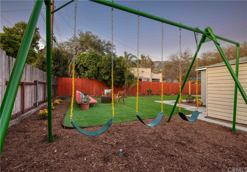 1041 Rose Avenue Pasadena, CA 91107 - Photo 31 of 33 a view of a backyard with a small cabin