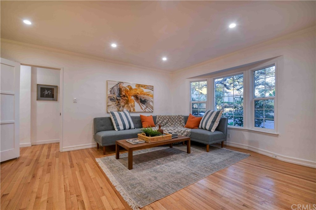 1041 Rose Avenue Pasadena, CA 91107 - Photo 6 of 33 a living room with furniture and a wooden floor