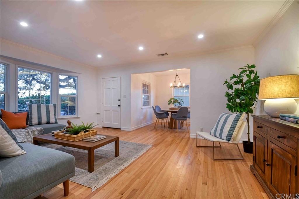 1041 Rose Avenue Pasadena, CA 91107 - Photo 7 of 33 a living room with furniture and a wooden floor
