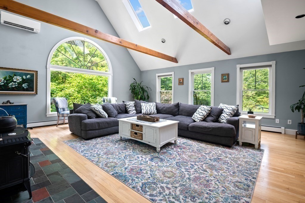 17 Woodman Road Amesbury, MA 01913 - Photo 12 of 38 a living room with furniture and a large window