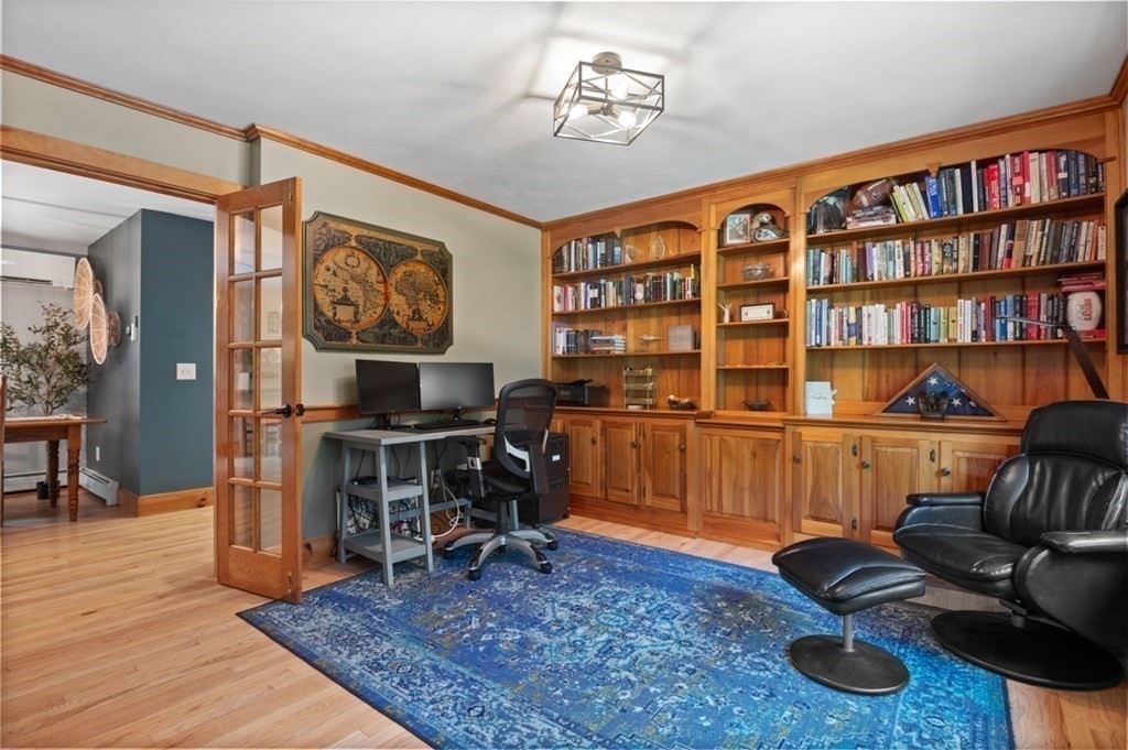 17 Woodman Road Amesbury, MA 01913 - Photo 15 of 38 a living room with furniture and wooden floor