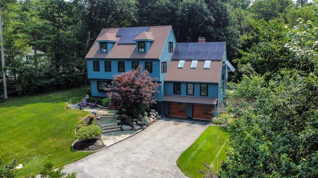 17 Woodman Road Amesbury, MA 01913 - Photo 2 of 38 front view of a house with a yard