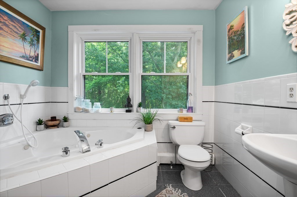 17 Woodman Road Amesbury, MA 01913 - Photo 25 of 38 a bathroom with a sink and a toilet