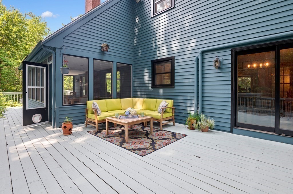 17 Woodman Road Amesbury, MA 01913 - Photo 28 of 38 a view of a chairs and table on the wooden floor