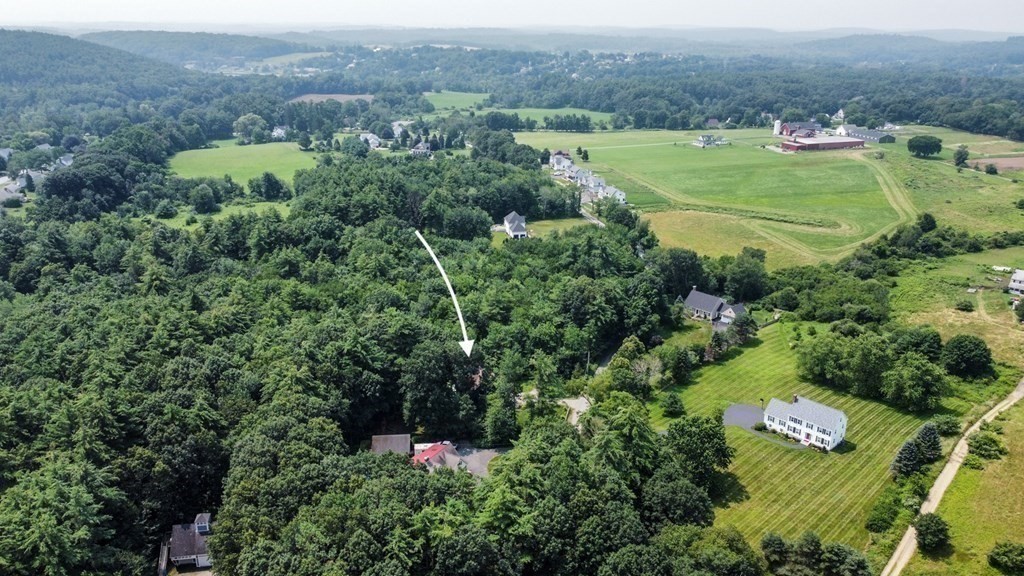 17 Woodman Road Amesbury, MA 01913 - Photo 33 of 38 an aerial view of residential house with outdoor space and trees all around