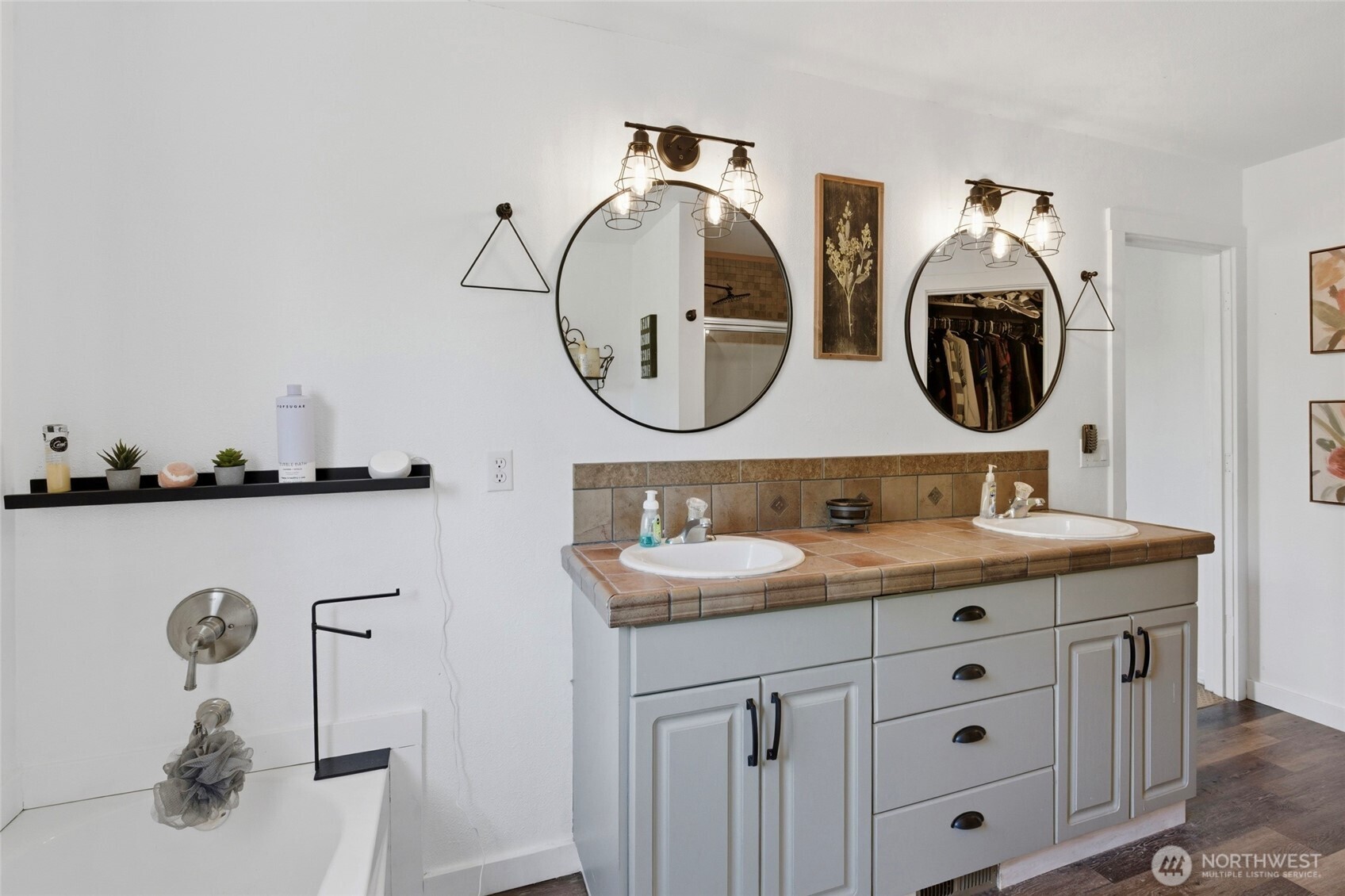 14005 Cedar Court Sultan, WA 98294 - Photo 30 of 38 a bathroom with a double vanity sink and a mirror