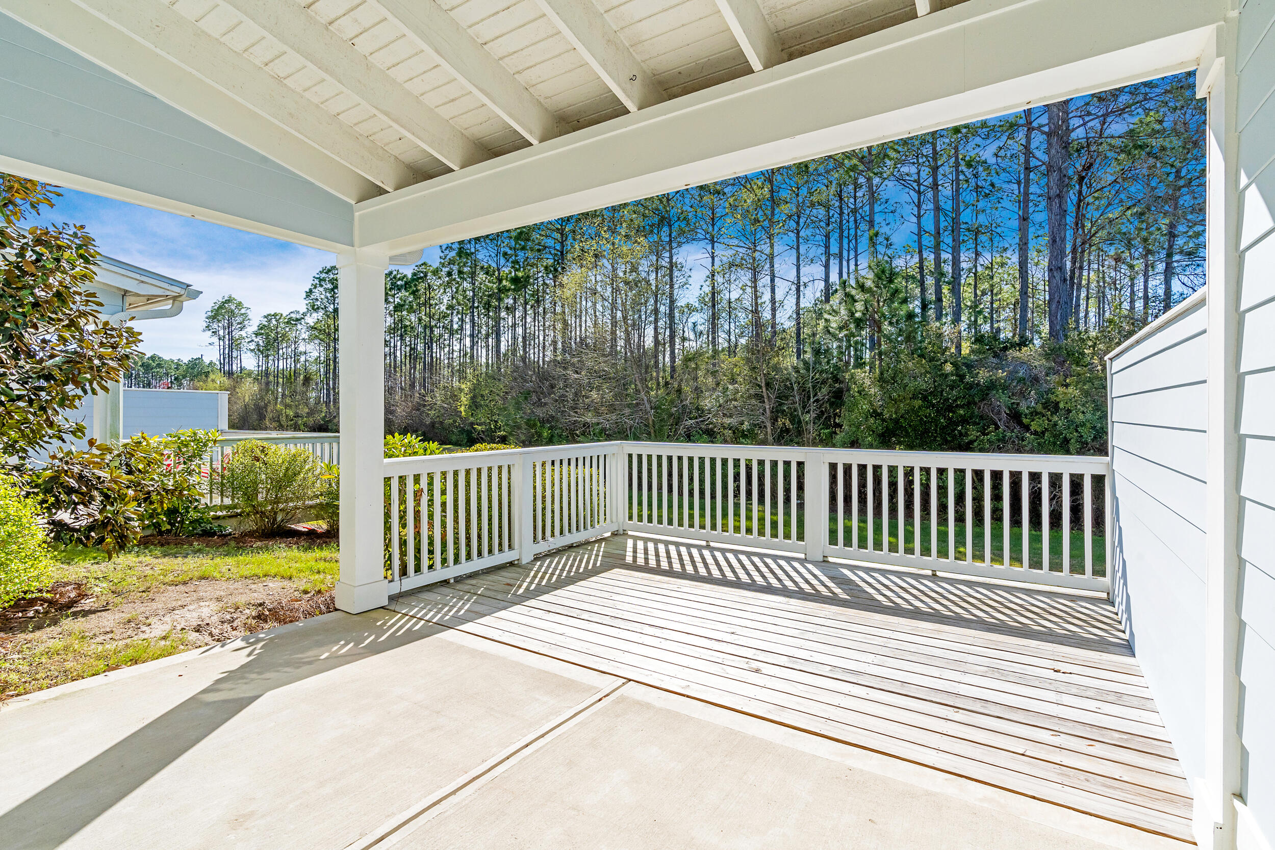 16 Golden Bell Ct Inlet Beach, Unit 16C Inlet Beach, FL 32461 - Photo 3 of 32 a view of a room with wooden floor and fence