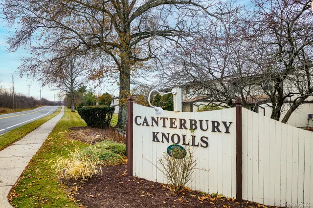 a sign on the side of the road