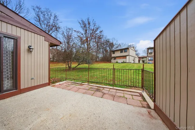 a view of a backyard with a house