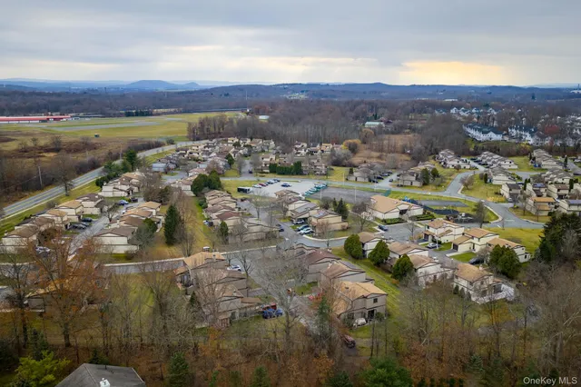 a view of a lake with a city