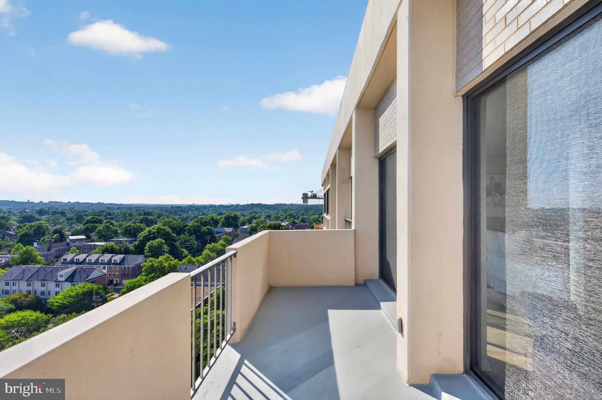 4141 North Henderson Road, Unit 1209 Arlington, VA 22203 - Photo 9 of 44 Huge balcony with huge view! Sunsets are AMAZING!