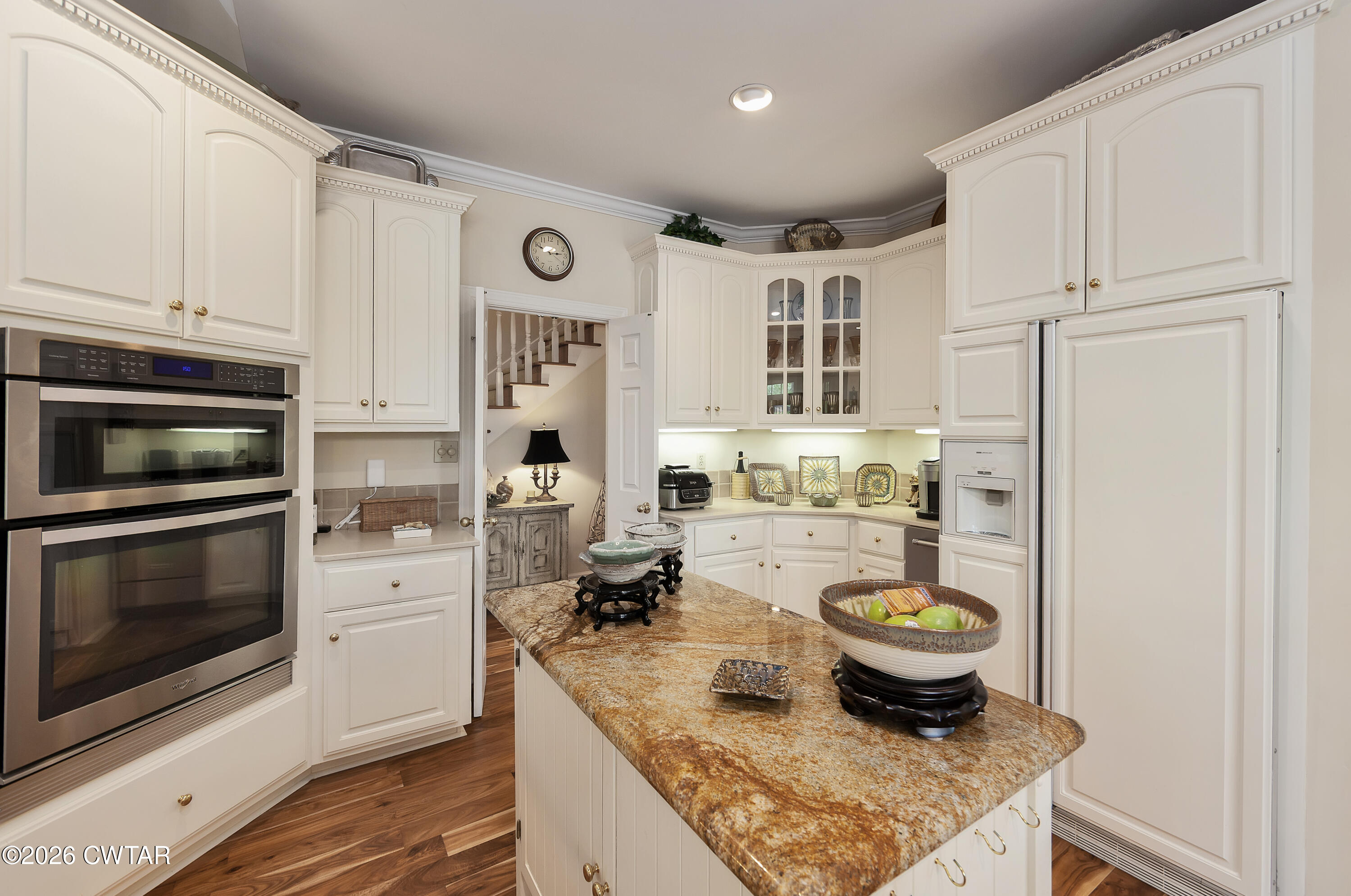 296 Liberty Claybrook Road Beech Bluff, TN 38313 - Photo 11 of 33 a kitchen with a stove and a refrigerator