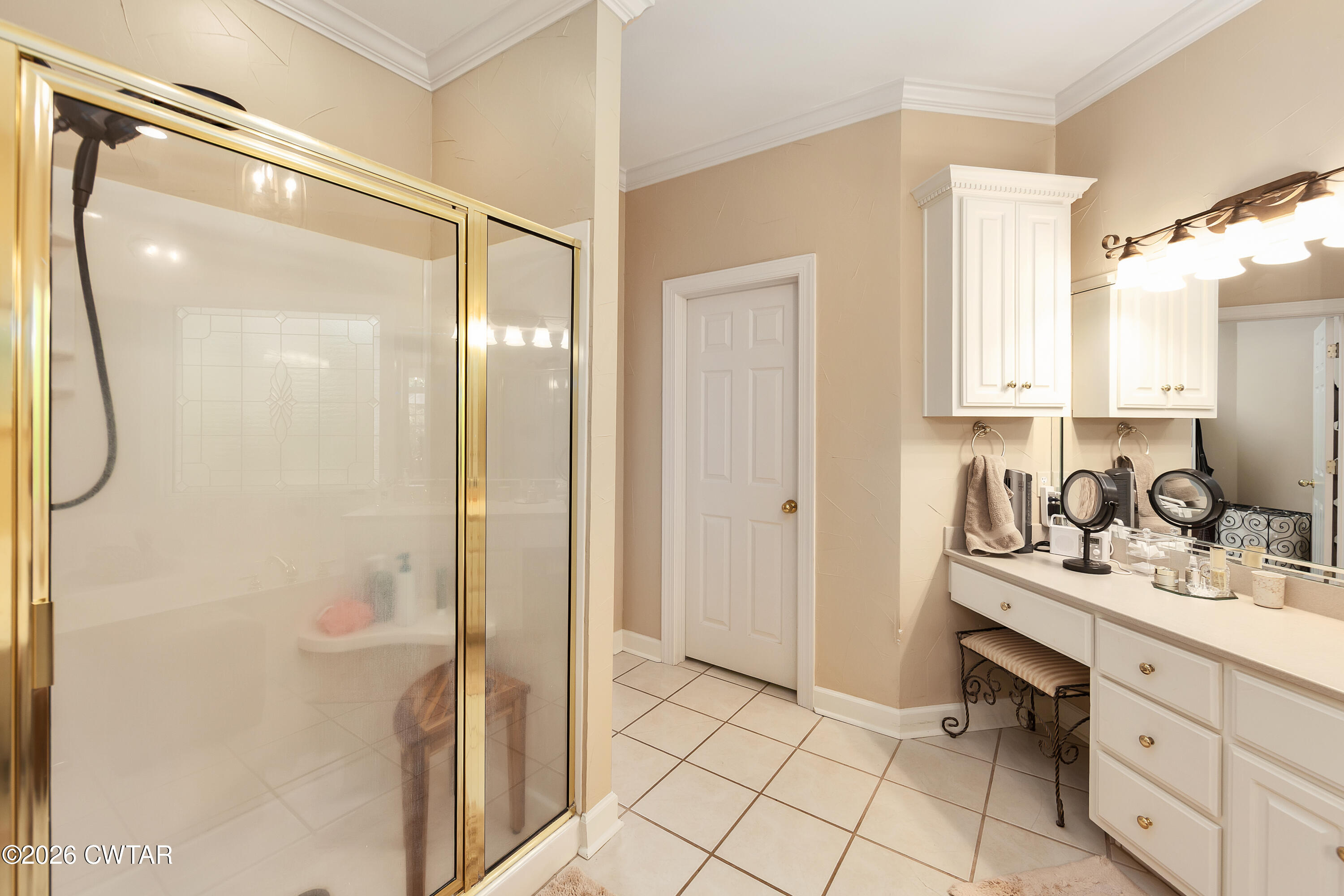 296 Liberty Claybrook Road Beech Bluff, TN 38313 - Photo 16 of 33 a bathroom with a double vanity sink mirror and shower