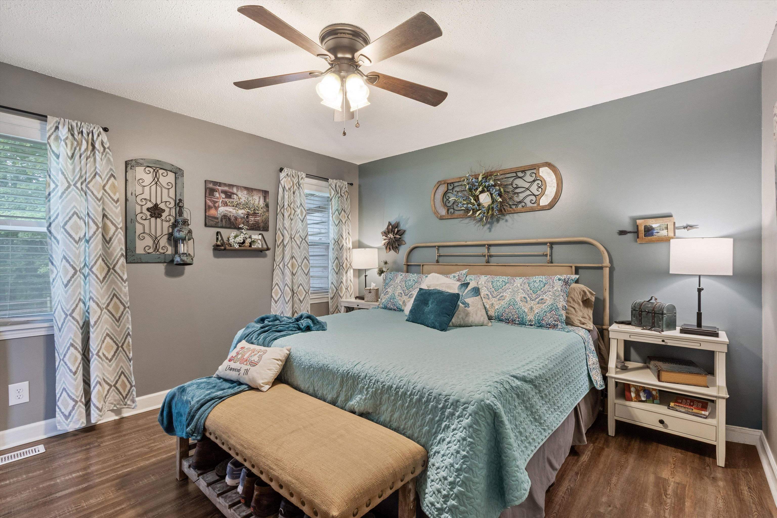 4500 Drummonds Road Drummonds, TN 38023 - Photo 13 of 29 a bedroom with a bed and wooden floor