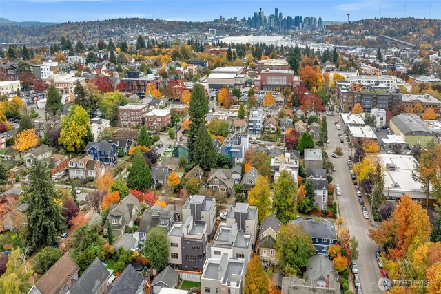 an aerial view of residential building and parking space