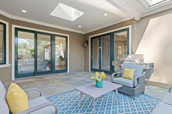 a lobby with furniture and window