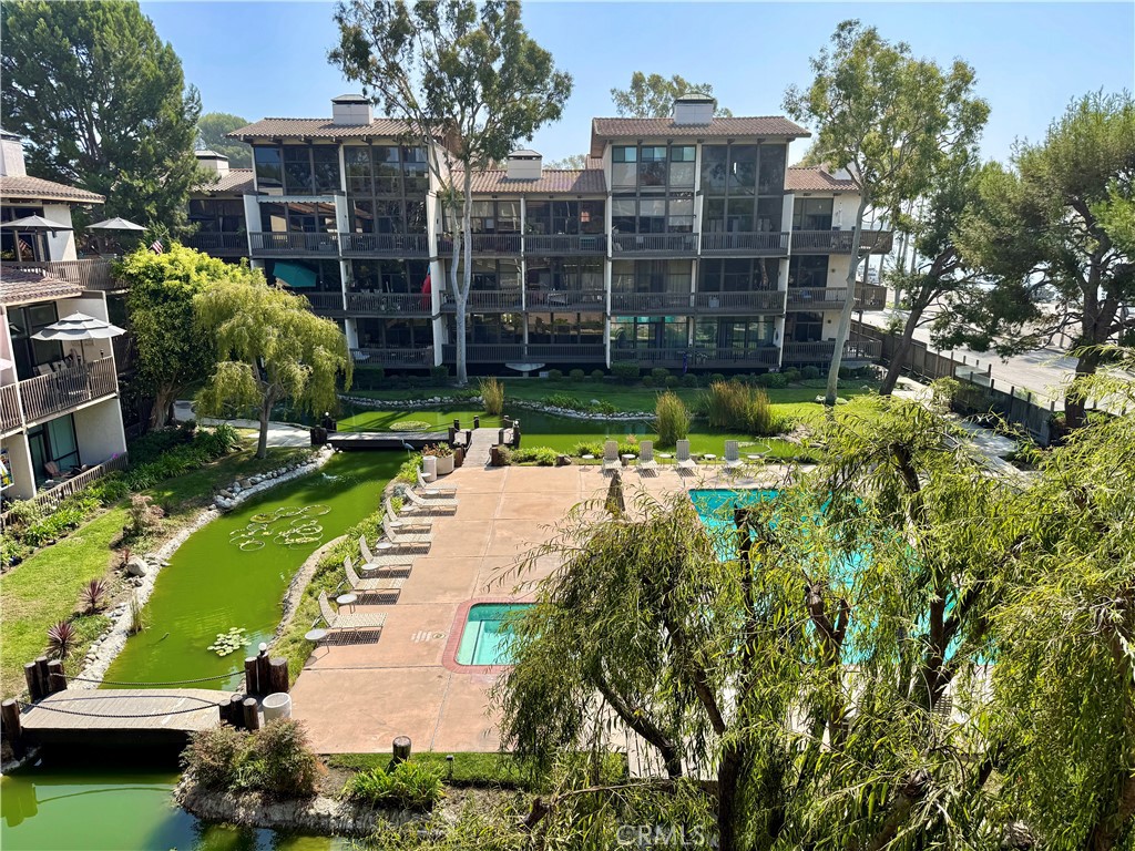6312 Marina Pacifica Drive Long Beach, CA 90803 - Photo 1 of 30 a view of a garden