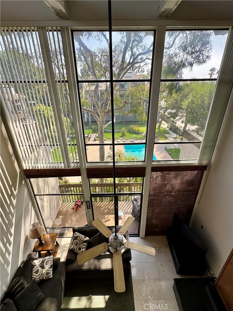 6312 Marina Pacifica Drive Long Beach, CA 90803 - Photo 17 of 30 a room with furniture and a window