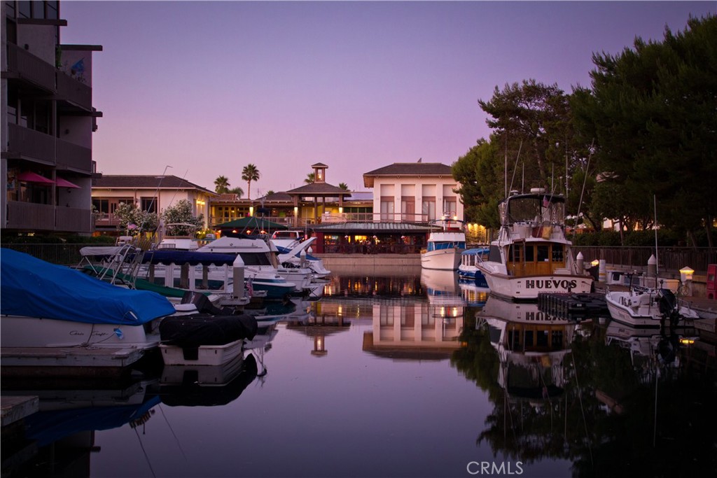 6312 Marina Pacifica Drive Long Beach, CA 90803 - Photo 25 of 30 a city street filled with lots of traffic