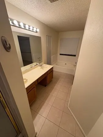 a room with a table and a mirror