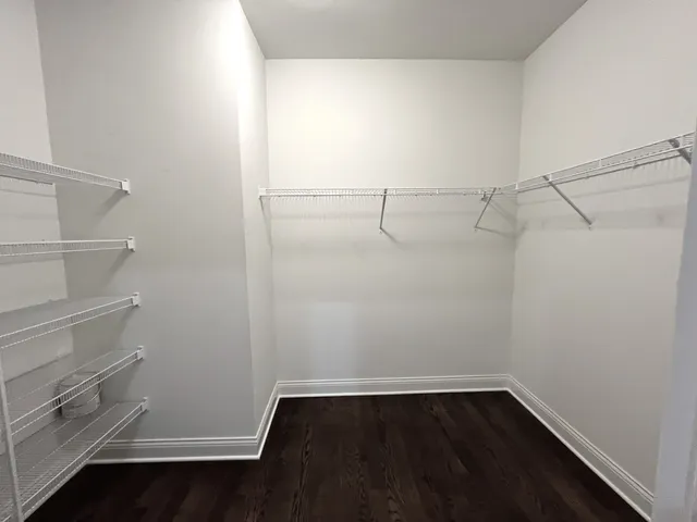 a view of an empty walk in closet