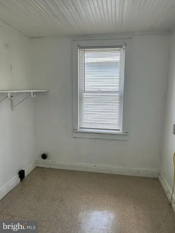 a view of a window in an empty room